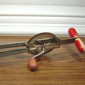 Vintage A&J Super Center Drive egg beater with red wood handle